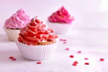 Delicious cupcakes on table close-up