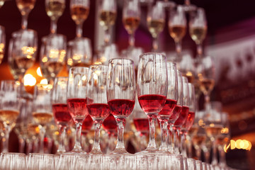Wedding glasses filled with wine and champagne