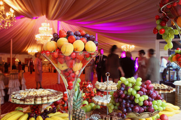 fresh fruits and cakes in a candy bar