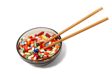 Fototapeta na wymiar Bowl with drugs and chopsticks