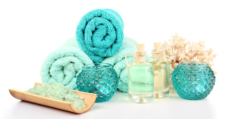 Obraz na płótnie Canvas Spa composition with towels and sea salt isolated on white