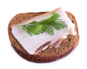 Sandwich with lard and parsley isolated on white