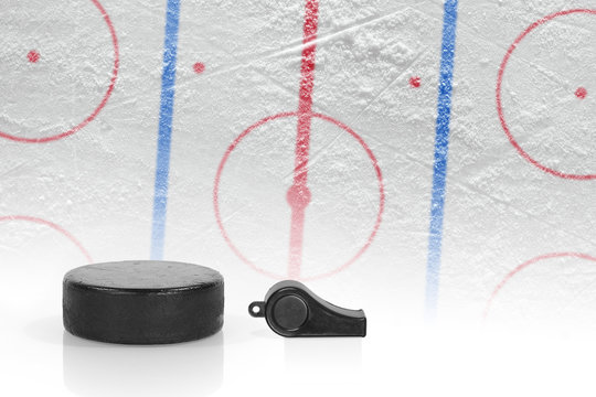 Referee whistle, the puck and hockey field