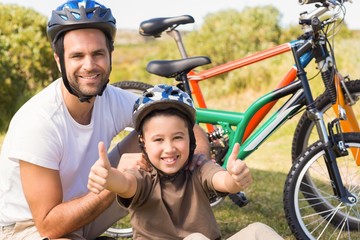 Obraz premium Father and son on a bike ride