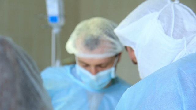 Operation: doctors in a circule on the general surgery