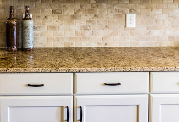 Granite Countertop and Tile Backsplash