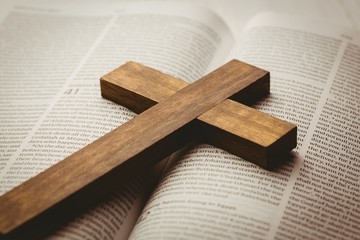 Open bible and wooden cross - obrazy, fototapety, plakaty