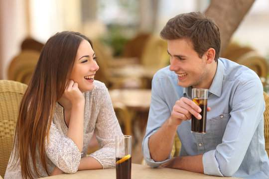 Couple or friends talking in a restaurant