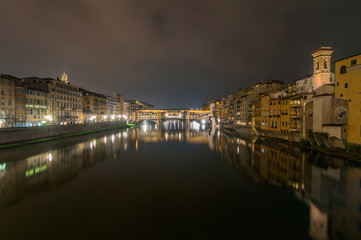 river Arno and Ponte Vecchio night view in Florence