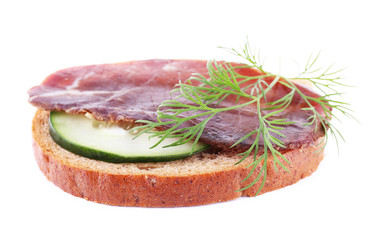 Sandwich with smoked meat, cucumber and dill isolated on white