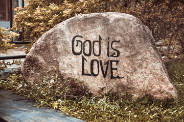 Stone "God is love" in Sri Lanka