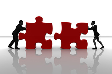 Team pushing jigsaw puzzle pieces