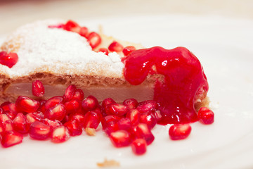 pomegranate cake with icing sugar