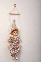 Clown doll and swing