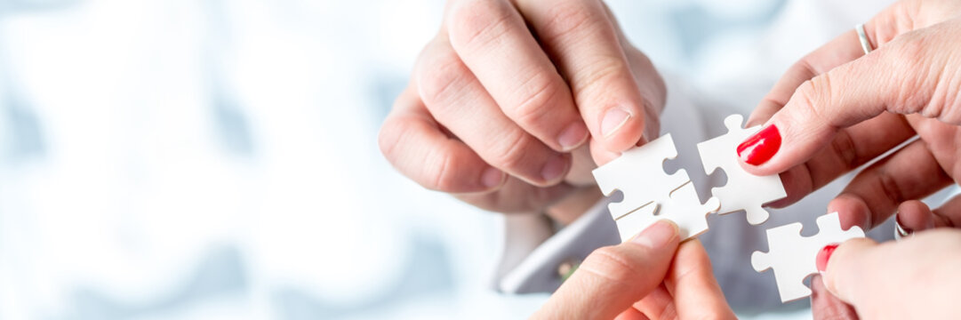 Teamwork concept using puzzle pieces