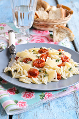 Pasta with sun dried tomatoes, cheese and thyme