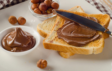 Toast with chocolate spread for  sweet breakfast.