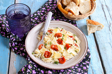 Pasta with sun dried tomatoes, cheese and thyme