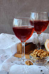 Two glasses with red wine.