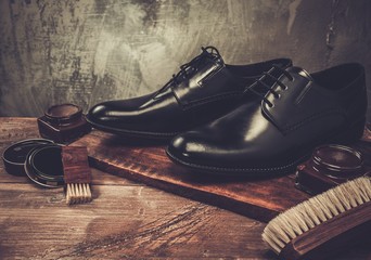 Shoe care accessories on a wooden table