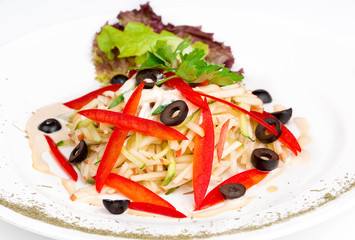 Salad with apples, cucumber, red pepper and olives