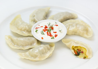 Nepalese food momo on a white background in the restaurant