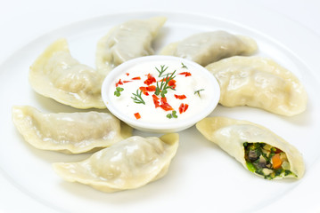 Nepalese food momo on a white background in the restaurant