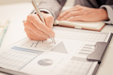 Business people discussing the charts and graphs showing the res