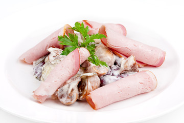 Salad with mushrooms and bacon in sauce