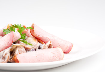 Salad with mushrooms and bacon in sauce
