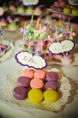 wedding dessert with delicious cakes and macaroons