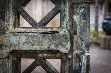 Rusty green iron gates