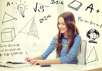 student girl with book, notebook and calculator