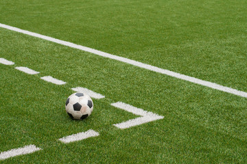 Soccer ball on artificial grass turf