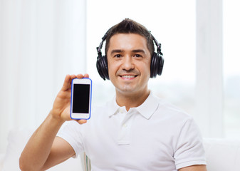 happy man with smartphone and headphones