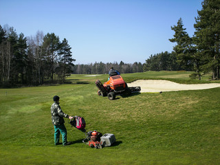 Workers on the golf course