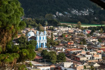 Zelfklevend Fotobehang Aerial View of San Cristobal church and town at Chiapas, Mexico. © diegocardini