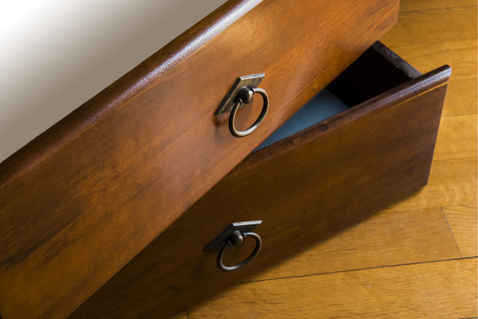 Two antique wooden drawers with bras knobs