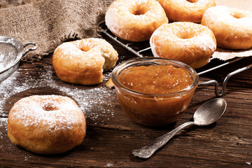 Homemade donuts on a wooden table