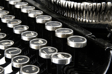 Old, dusty typewriter seen up close.
