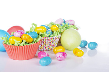 Fototapeta na wymiar Easter Candy in colorful cupcake wrappers