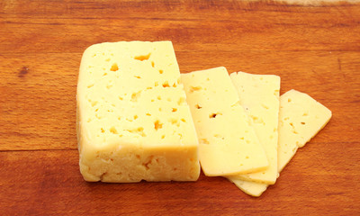 Cheese on a wooden background
