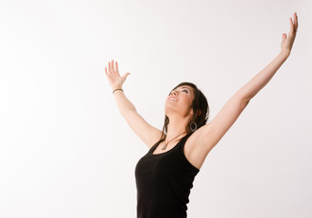 Fototapeta na wymiar Woman Celebrates Winning Attitude Arms Outstretched Reaching Upw