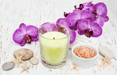 Candle, orcids and towels