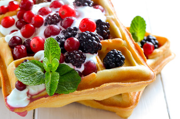 Belgian waffles with yogurt and berries - obrazy, fototapety, plakaty