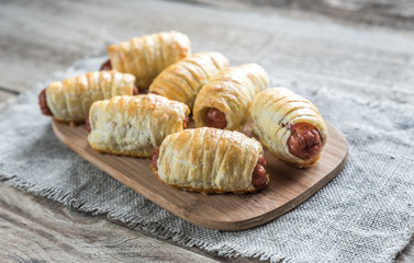 Bowl with sausage rolls