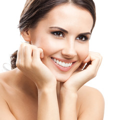Portrait of smiling young woman, over white