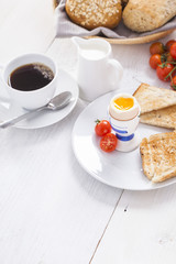 Obraz na płótnie Canvas English breakfast on white wooden table