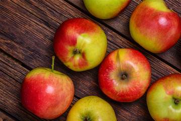 Fresh apples on wooden table
