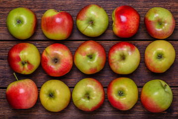 Fresh apples on wooden table